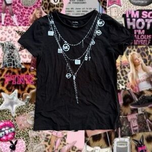 Black graphic tee from Michael Kors featuring metallic silver chain necklace